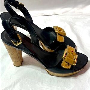 Stuart Weitzman Patent Leather Elegant Black and Tan Heels with Open Toe Design